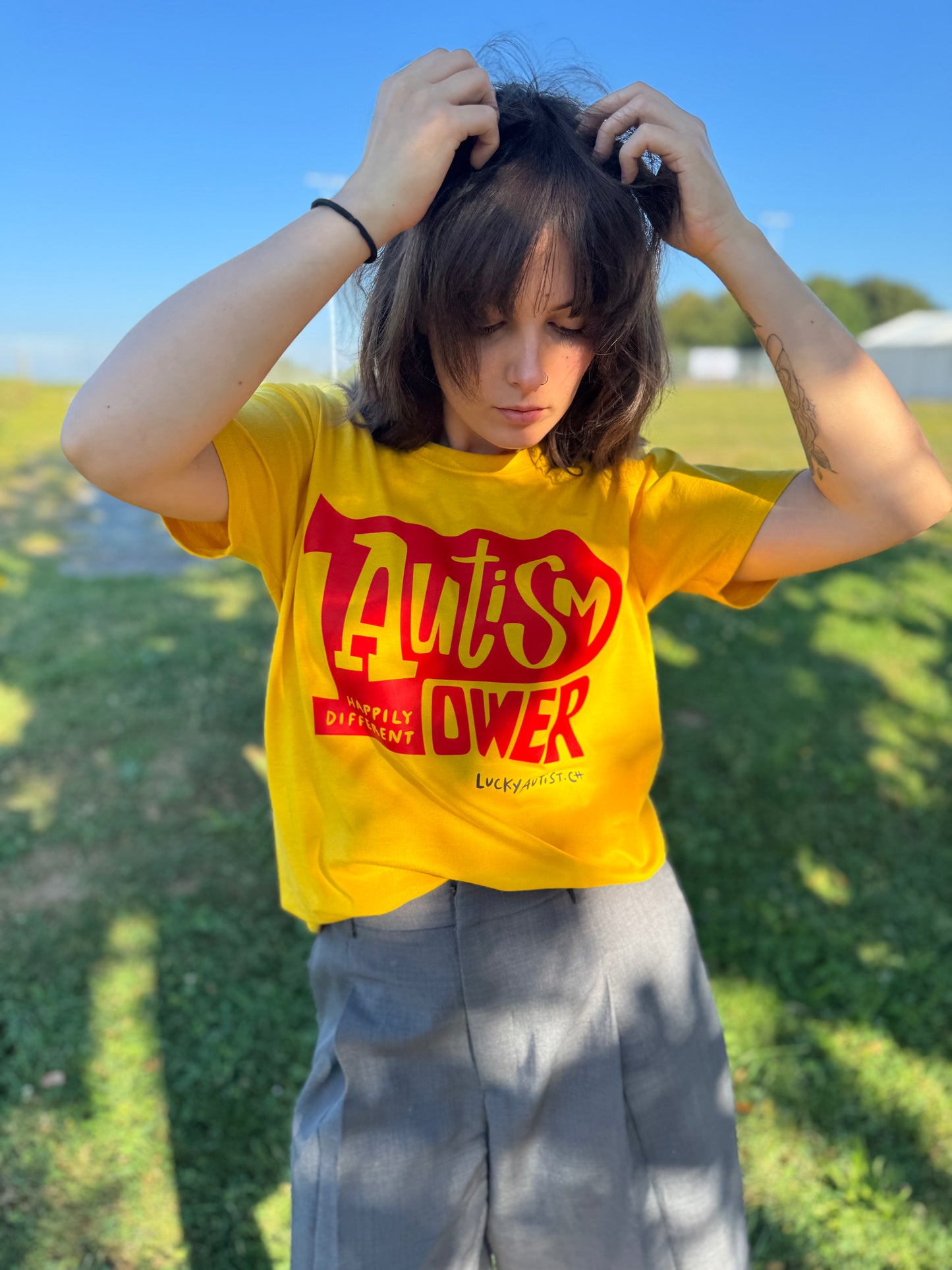 AUTISM POWER STREET Gold unisex t-shirt